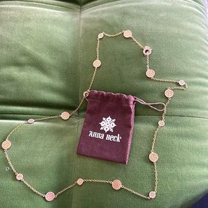 Anna Beck. Long multi disc station necklace